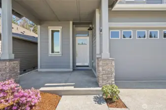Large, covered front porch welcomes you. Perfect for sitting outside and staying out of inclement weather.