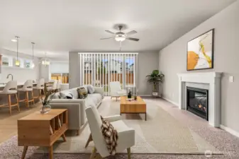 Virtually staged photo of living room for illustration to showcase gas fireplace, for those cozy nights and a ceiling fan to keep you comfortable during the warmer months.