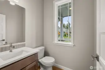 Main floor half bath is perfect for guests.