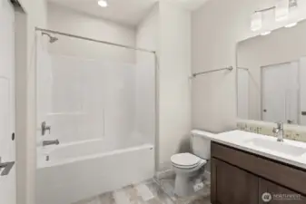 Jr. Suite full bathroom with shower/tub combo on main floor.