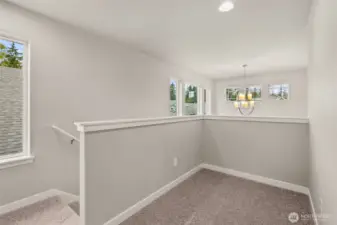 Second floor landing area features a great flexible space, perfect for studying or perhaps a reading nook.