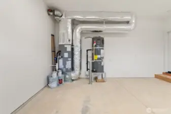 High efficiency Carrier electric forced-air furnace and Electric hybrid water heater.