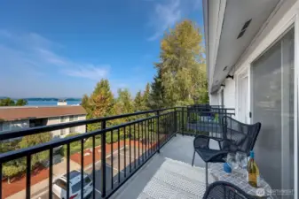 Large view balcony! Almost the length of the entire unit! Modern, wrought iron railings. BBQs ok.