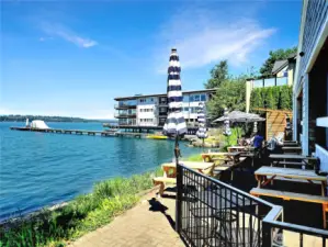 Beach Cafe and Bar's outdoor seating and private moorage for guests across the street.