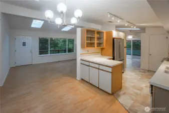 Living Room Flows to Dining Area, Kitchen and Family Room