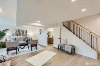 Custom stairway carries into the lower level