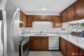 Bright Kitchen with lots of Cabinets and Counter Space