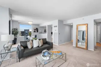 Spacious living room with large view windows overlooking downtown Bellevue
