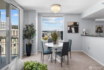 Elegant dining space with city light views in Bellevue Pacific Tower