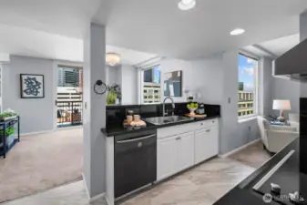 Gourmet kitchen with ample cabinetry in downtown Bellevue condo