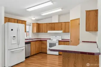 kitchen with newer appliances, new floor and large pantry!