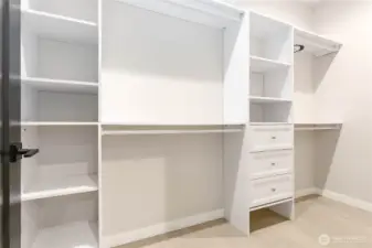 Primary suite walk-in closet.