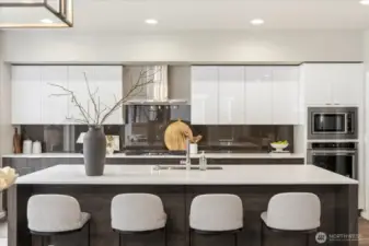 The Culinary Stage: High-performance stainless steel appliance package and a generous quartz island anchor effortless hosting.