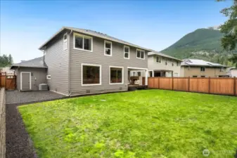 The Backyard Sanctuary: A level, fully fenced private retreat designed for quiet afternoons and soaking in views.