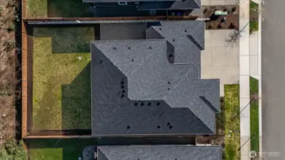 A generous, fully fenced backyard offers space to live, play, and gather.