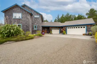 As you drive up to the home on the expansive driveway