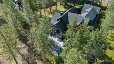 The next door neighbors built their home in the middle of 2 sites so this home gets the benefits of an even larger separation between homes.  Lovely space all the way around. No homes across from you, or between you and the ponds. Perfect family home!