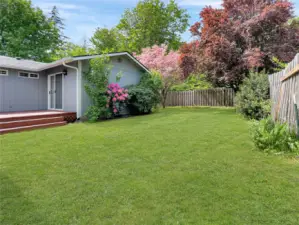 Right side of house deck and slider to primary bedroom.