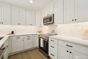 Photos are of staged unit 20311 A. Similar finishes and floorplan