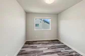 2nd Bedroom with Nice Closet Organzier. Room is bigger than appears
