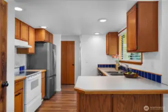 Kitchen with pantry door on your left