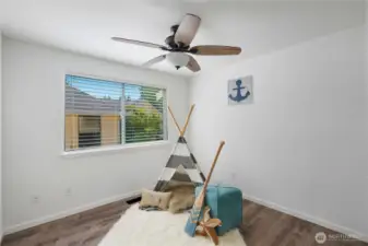 Bedroom 2 with ceiling fan.