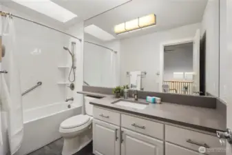 Upstairs full bathroom to be shared by the two upstairs bedrooms. More quartz countertops and beautiful finishes.