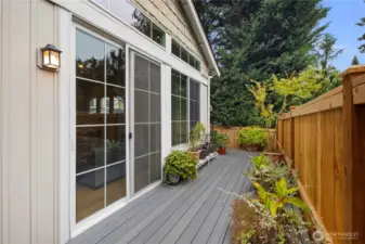 Large sliders and a screen door make indoor/outdoor living easy.