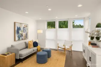 Living room features floor-to-ceiling windows and custom window treatments.