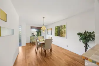 The dining area also offers two large picture windows and room for extra seating or a large dinning table.