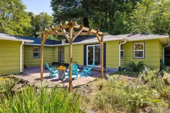 The courtyard area with patterned pavers and raised garden beds, waits for your green thumb, or gardener!  Place summer outdoor curtains on the arbor or grow climbers. Perfect for entertaining or private retreat.
