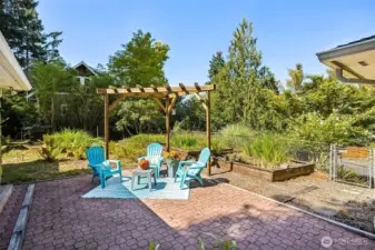 Serve fresh veggies right out of your garden beds or play catch with Fido. The courtyard and lower terraced garden area is completely fenced.