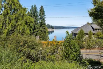 The above the street terraced gardens offer a future space for view development, a raised platform sundeck off the small deck on the front of the house, for example, could add more outdoor view options.