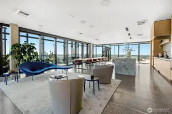 Panoramic rooftop commercial kitchen and dining to the views.