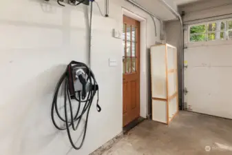 Electric Vehicle charger in the garage.