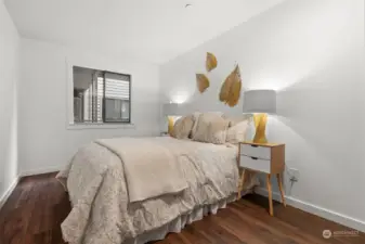 A second bedroom is bright with fresh white interior paint and steps from a 3/4 bathroom.