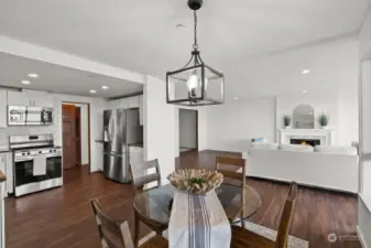 New luxury vinyl plank flooring flows seamlessly throughout the condominium, creating a cohesive and stylish connection between each room.