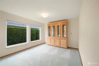 The dining room contains a built-in buffet.