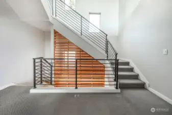 Roomy 2nd floor landing leading up to office/flex/loft space.