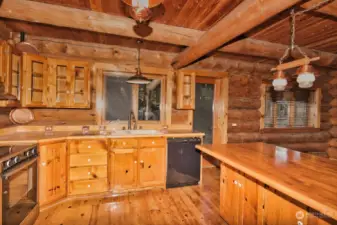 Roomy kitchen with plenty of cabinets and counter space.