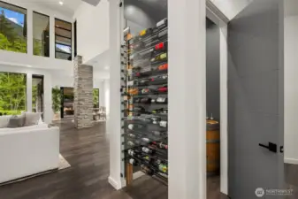 Your guests are sure to be impressed by your wine collection stored in your cool architectural custom wine room.
