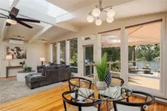 This is the South Facing, great room...oriented for views of Pine Lake...very sunny and bright.  The awning you see is retractable...and is on a remote control for easy use.