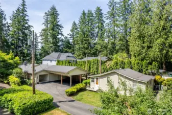 Main house on the left, cabin on the right.  The cabin is occupied by a long-term tenant.  Tenant would love to continue living there if you would like some rental income.  Ready to vacate if you want the cabin as a private guest house.
