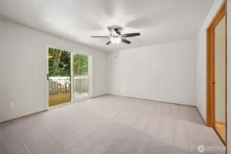 Primary bedroom with back yard access