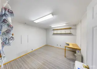 Finished office space inside the outbuilding offers a quiet spot for work-from-home, hobbies, or creative projects.