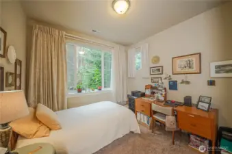 The downstairs flex room can easily be used as a guest room, office, craft room, exercise room...or whatever your heart desires!