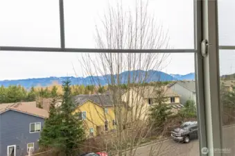 The Cascade mountain views from your primary window. In real life they look even closer!