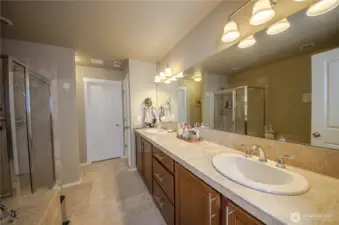 The primary bath features this large vanity with two sinks. Isn't is nice to have so much space for your morning routine.