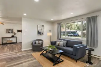 Living room leading into the Family and Dining rooms