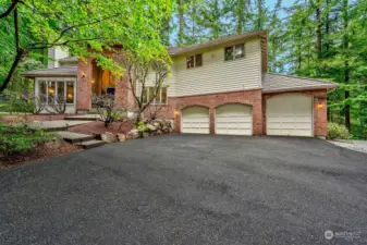 English Hill home surrounded by beautiful trees makes this home private. 3-car garage with large third bay garage door.